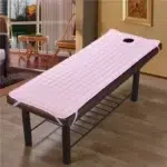Sur matelas table de massage